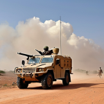 **

"A sturdy armored vehicle traverses a dusty Somali landscape. Armed guards stand vigilant. In the background, a local village is visible, showing signs of daily life, yet a sense of caution prevails. The sky is a mix of clear blue and distant dust clouds. Emphasize safety, vigilance, and cultural awareness. High quality, realistic."

**